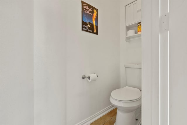 411 Ceole Ln, League City, TX 77573 - bathroom with toilet, baseboards, and tile patterned flooring