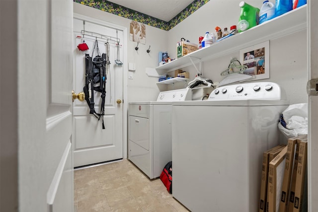 411 Ceole Ln, League City, TX 77573 - laundry room with washer and dryer and light tile patterned floors