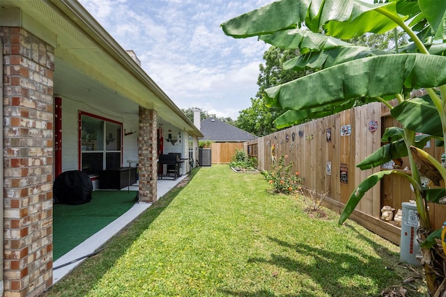 411 Ceole Ln, League City, TX 77573 - view of yard featuring a patio area