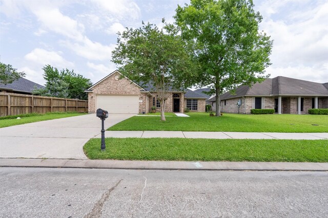 411 Ceole Ln, League City, TX 77573 - ranch-style home featuring brick siding, driveway, and an attached garage