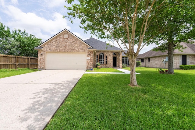 411 Ceole Ln, League City, TX 77573 - view of front of property with a garage, driveway, and brick siding