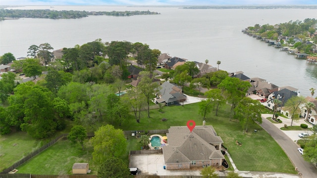 12431 Lake Vista Dr, Willis, TX 77318 - aerial overview of property's location with a large body of water and nearby suburban area