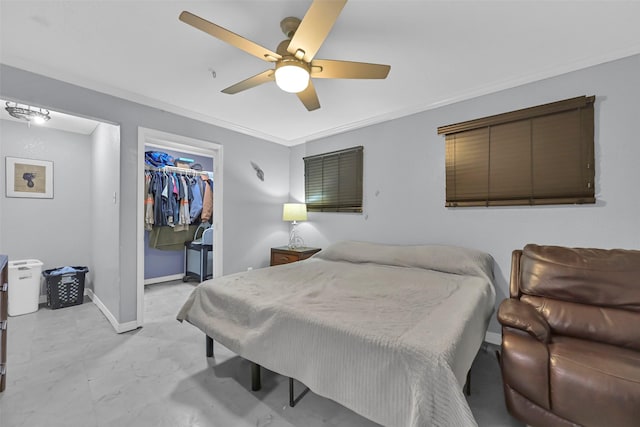 1202 Harbor View Dr, Galveston, TX 77550 - bedroom with a ceiling fan, a closet, ornamental molding, baseboards, and a spacious closet