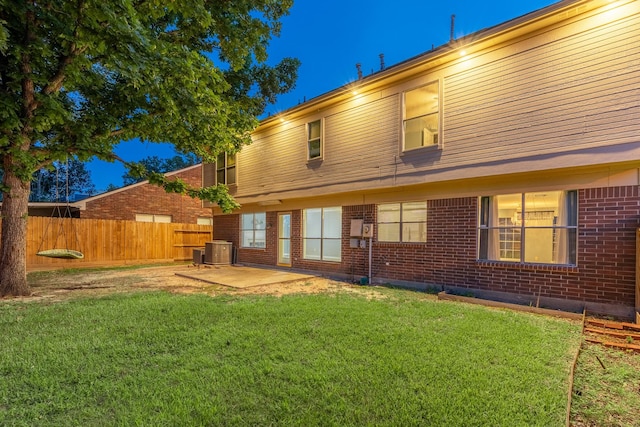 10030 Storm Meadow Dr, Houston, TX 77064 - back of house with a patio area, brick siding, and cooling unit