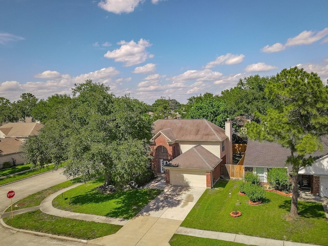 10030 Storm Meadow Dr, Houston, TX 77064 - traditional home featuring brick siding, driveway, a front lawn, a garage, and a chimney