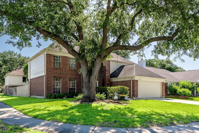 10030 Storm Meadow Dr, Houston, TX 77064 - traditional-style home with brick siding, a garage, driveway, and a chimney