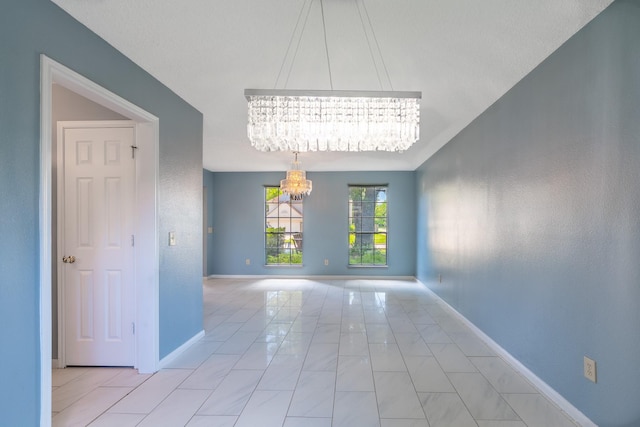 10030 Storm Meadow Dr, Houston, TX 77064 - unfurnished room with a chandelier and baseboards