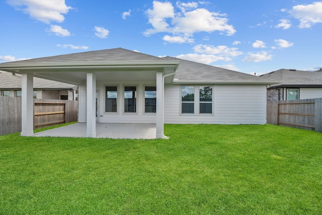 15230 Prairie Mill Dr, New Caney, TX 77357 - rear view of house featuring a patio, a fenced backyard, and a shingled roof