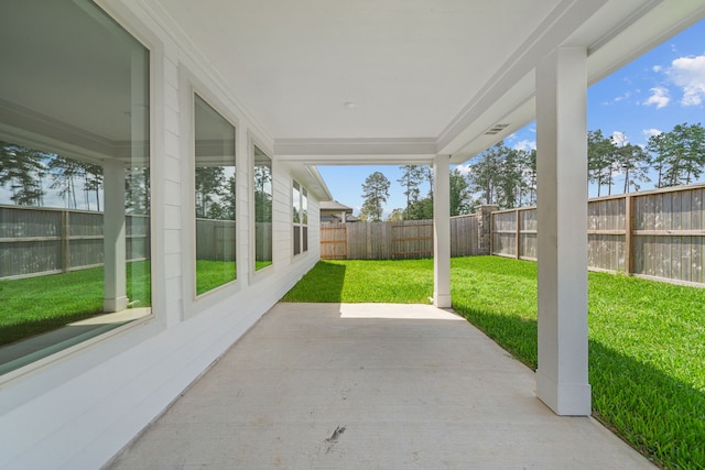 15230 Prairie Mill Dr, New Caney, TX 77357 - fenced backyard with a patio area