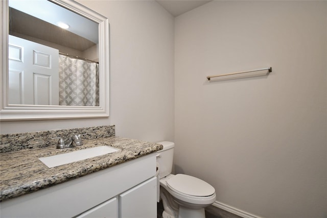 16893 W Forrestal, Montgomery, TX 77316 - full bathroom with vanity, toilet, baseboards, and a shower with curtain