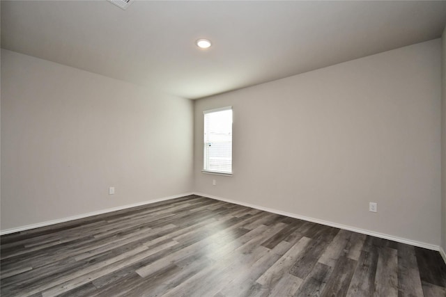 16893 W Forrestal, Montgomery, TX 77316 - spare room with dark wood-style floors and baseboards