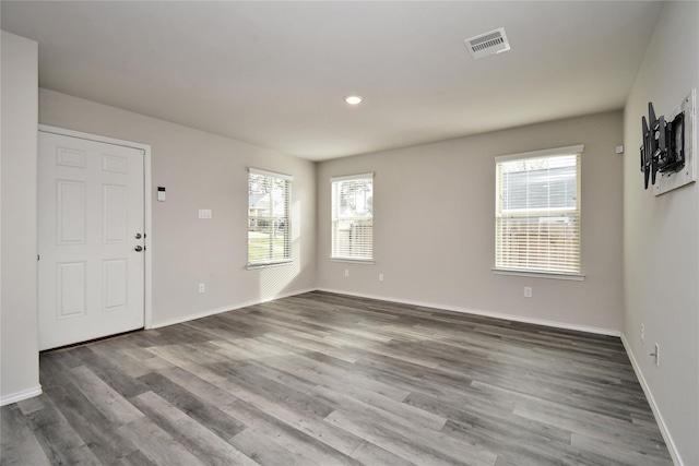 16893 W Forrestal, Montgomery, TX 77316 - foyer with wood finished floors, baseboards, and recessed lighting