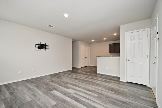 16893 W Forrestal, Montgomery, TX 77316 - unfurnished living room featuring recessed lighting, wood finished floors, and baseboards