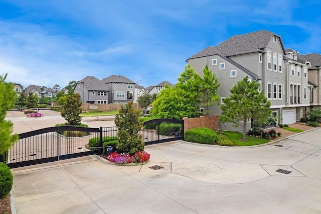10603 Centre Green Way, Houston, TX 77043 - exterior space with a residential view, a gate, and curbs
