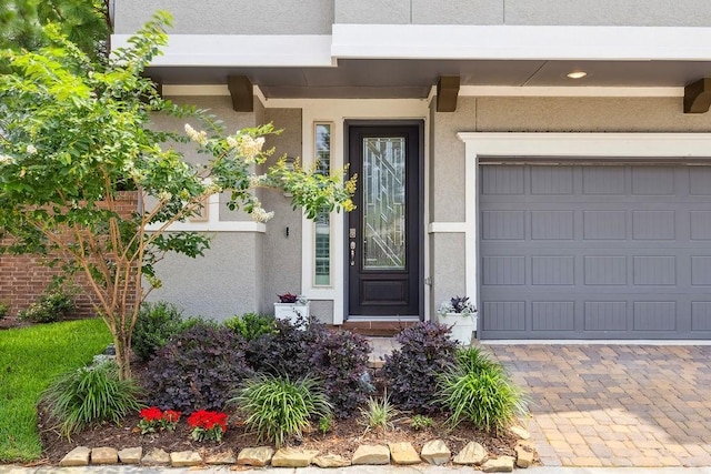 10603 Centre Green Way, Houston, TX 77043 - property entrance with stucco siding and a garage