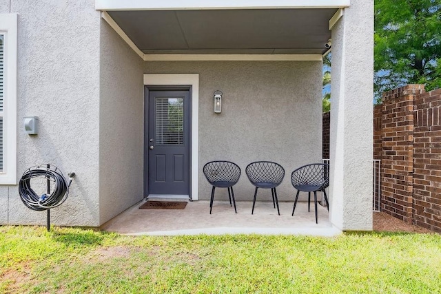 10603 Centre Green Way, Houston, TX 77043 - entrance to property featuring stucco siding and a lawn