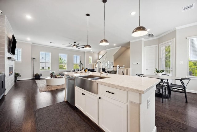 10603 Centre Green Way, Houston, TX 77043 - kitchen featuring ornamental molding, dark wood-type flooring, open floor plan, dishwasher, and recessed lighting