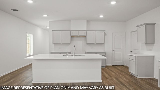 1350 Heather Rosewood Ln, Conroe, TX 77301 - kitchen featuring a sink, gray cabinets, a center island with sink, dark wood-type flooring, and recessed lighting