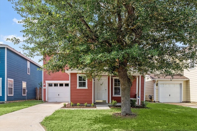 10010 Victoria Falls Ln, Houston, TX 77075 - view of property hidden behind natural elements featuring driveway, a garage, and a front yard
