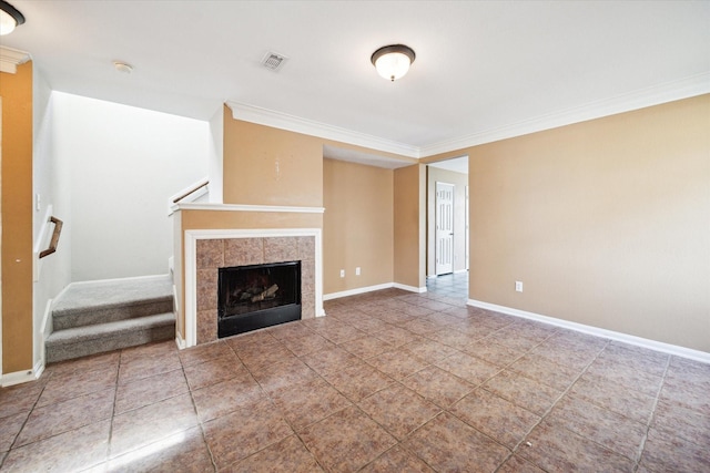 10010 Victoria Falls Ln, Houston, TX 77075 - unfurnished living room with ornamental molding, baseboards, tile patterned flooring, and stairs