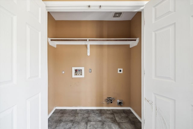 10010 Victoria Falls Ln, Houston, TX 77075 - laundry area featuring gas dryer hookup, hookup for a washing machine, electric dryer hookup, and baseboards