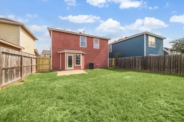 10010 Victoria Falls Ln, Houston, TX 77075 - back of house with central AC and a patio area