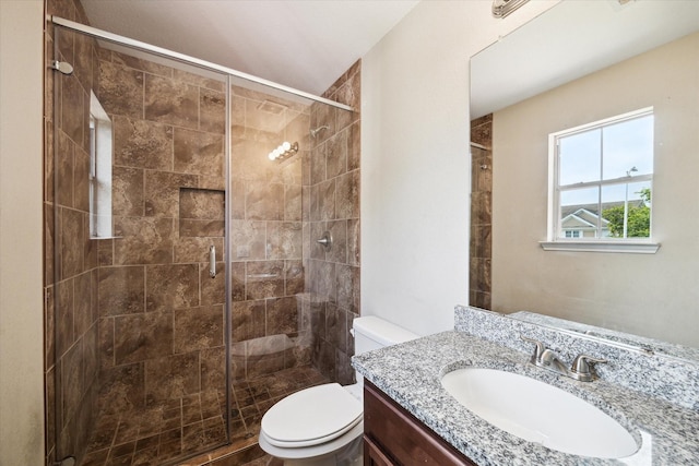 10010 Victoria Falls Ln, Houston, TX 77075 - bathroom with toilet, a stall shower, and vanity