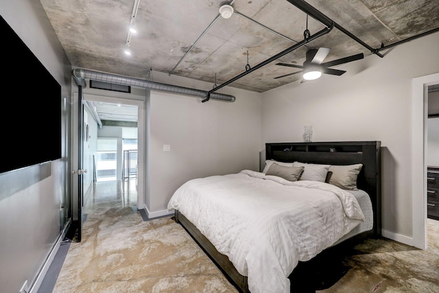 2000 Bagby St Unit 5426, Houston, TX 77002 - bedroom featuring unfinished concrete floors, baseboards, and a ceiling fan