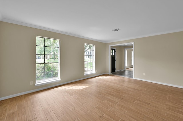 1614 Sweet Grass Trl, Houston, TX 77090 - empty room with crown molding, baseboards, and light wood-style floors