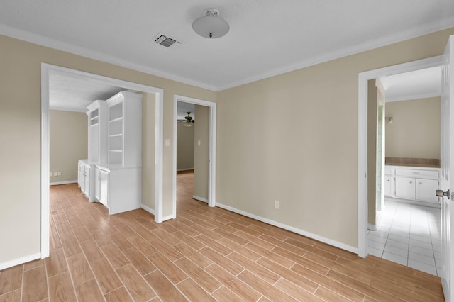 1614 Sweet Grass Trl, Houston, TX 77090 - unfurnished bedroom featuring ornamental molding, baseboards, and light wood-style floors