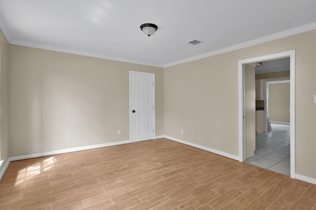 1614 Sweet Grass Trl, Houston, TX 77090 - empty room with light wood-type flooring, baseboards, and crown molding