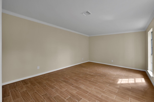 1614 Sweet Grass Trl, Houston, TX 77090 - spare room with baseboards, ornamental molding, and light wood-style flooring