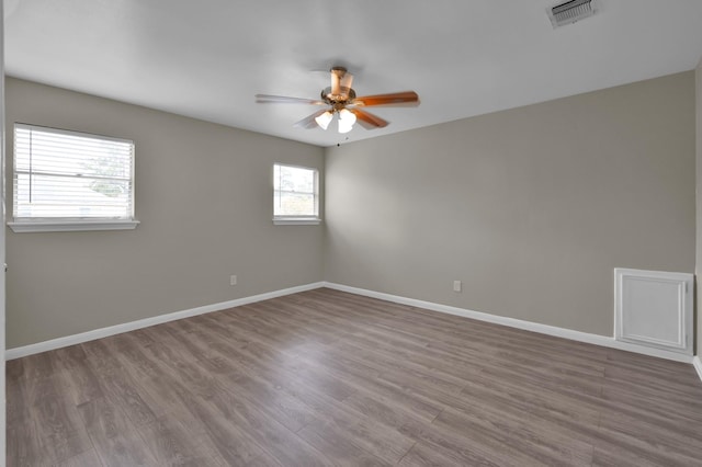 1614 Sweet Grass Trl, Houston, TX 77090 - unfurnished room with a ceiling fan, wood finished floors, and baseboards