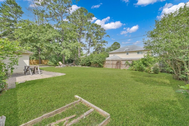 1614 Sweet Grass Trl, Houston, TX 77090 - view of yard featuring a patio area