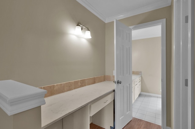 1614 Sweet Grass Trl, Houston, TX 77090 - bathroom featuring ornamental molding, vanity, and wood finished floors