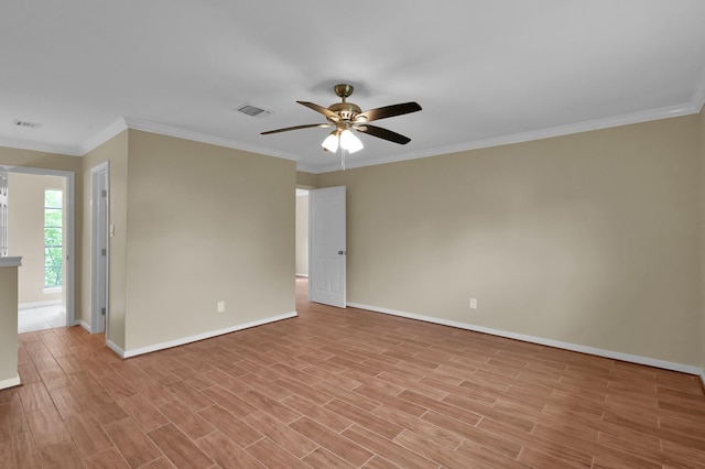 1614 Sweet Grass Trl, Houston, TX 77090 - spare room featuring baseboards, a ceiling fan, light wood-style flooring, and ornamental molding