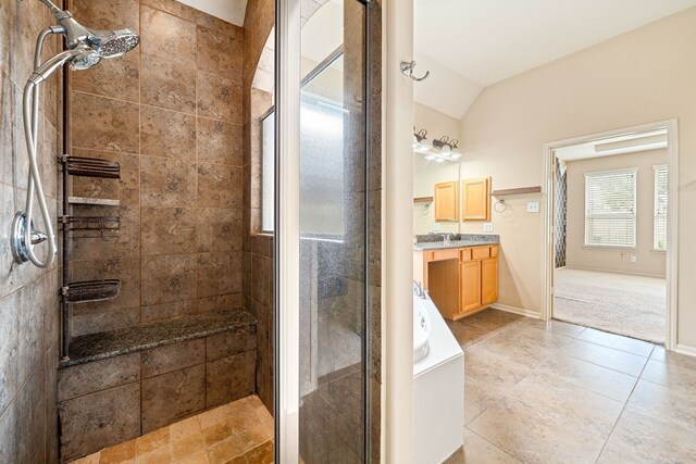 28523 Kinglet Pines Dr, Katy, TX 77494 - full bathroom featuring a shower stall, vanity, a tub, lofted ceiling, and tile patterned flooring