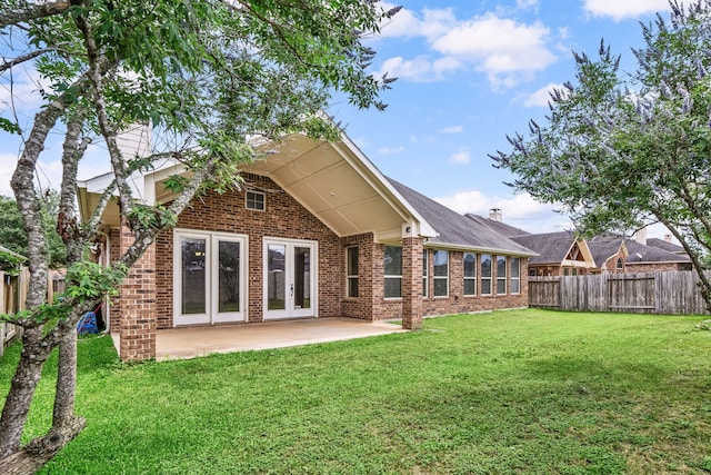 28523 Kinglet Pines Dr, Katy, TX 77494 - rear view of property with brick siding, a patio, and french doors