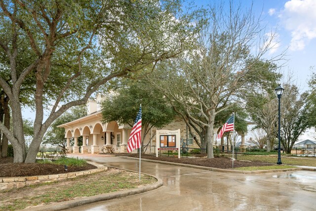 28523 Kinglet Pines Dr, Katy, TX 77494 - view of building exterior featuring curved driveway