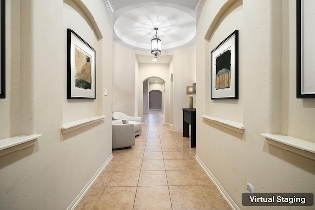 28523 Kinglet Pines Dr, Katy, TX 77494 - corridor featuring arched walkways, light tile patterned floors, and baseboards
