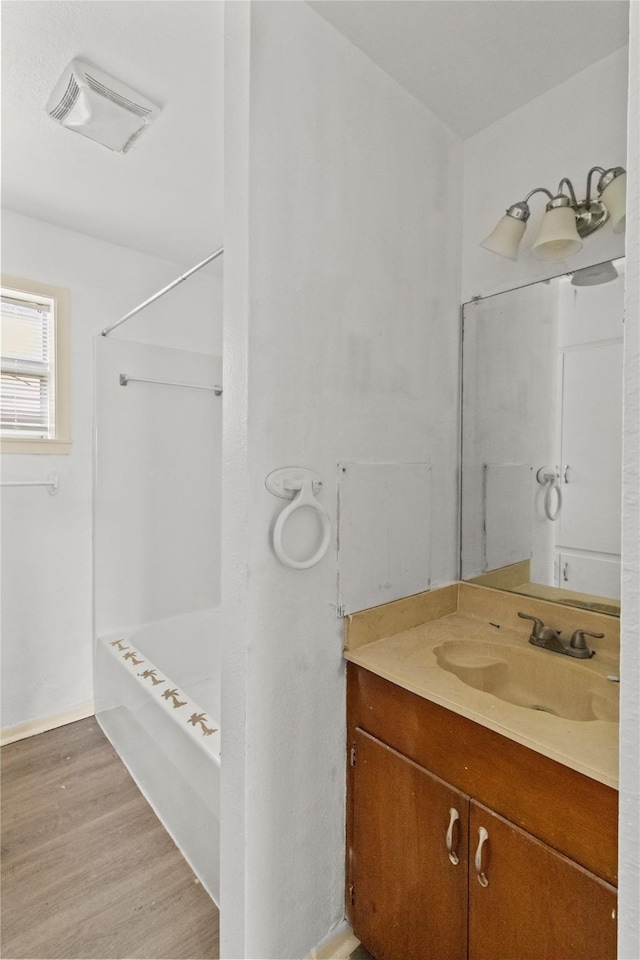 1522 Seawall Blvd, Galveston, TX 77550 - full bath with vanity, wood finished floors, and bathtub / shower combination