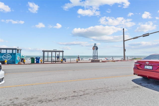 1522 Seawall Blvd, Galveston, TX 77550 - view of asphalt road with a water view