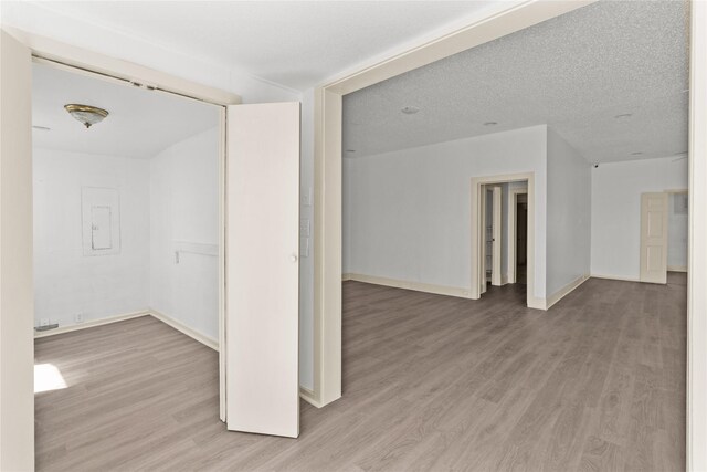 1522 Seawall Blvd, Galveston, TX 77550 - spare room with wood finished floors and electric panel