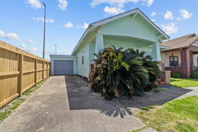 1522 Seawall Blvd, Galveston, TX 77550 - view of side of home with driveway and a garage