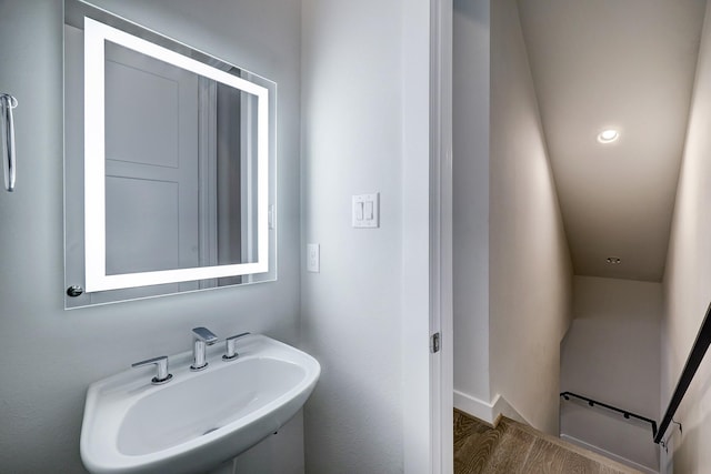 1203 Hickory St Unit D, Houston, TX 77007 - bathroom with a sink, wood finished floors, and baseboards