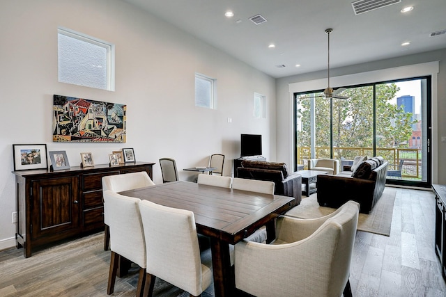 1203 Hickory St Unit D, Houston, TX 77007 - dining space featuring light wood finished floors and recessed lighting