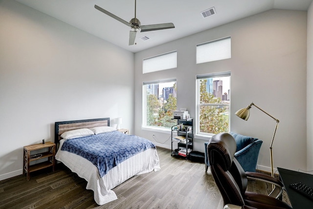 1203 Hickory St Unit D, Houston, TX 77007 - bedroom with wood finished floors, an office area, baseboards, a ceiling fan, and high vaulted ceiling