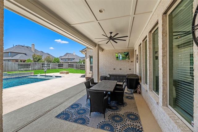 27710 Bering Crossing Dr, Katy, TX 77494 - fenced backyard featuring a patio, a ceiling fan, and outdoor dining space