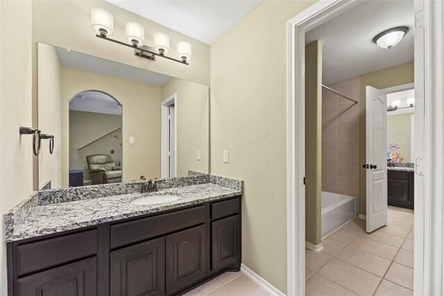 27710 Bering Crossing Dr, Katy, TX 77494 - bathroom with tile patterned flooring, vanity, bathing tub / shower combination, and baseboards