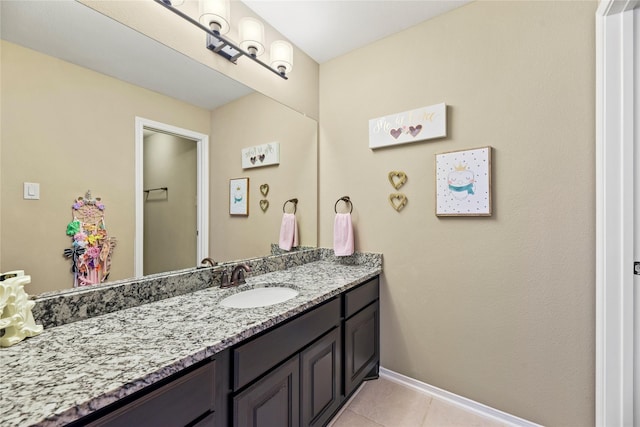 27710 Bering Crossing Dr, Katy, TX 77494 - bathroom featuring vanity, tile patterned flooring, and baseboards